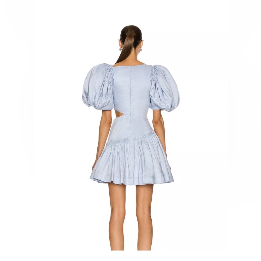 AJE CALIENTE CUT OUT DRESS.